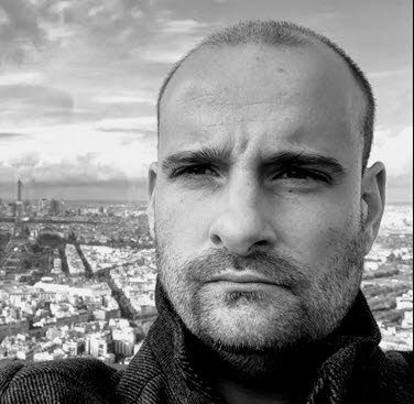 Author and composer Paul Horrell, photographed above the Paris skyline